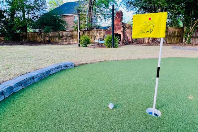 Artificial turf putting green